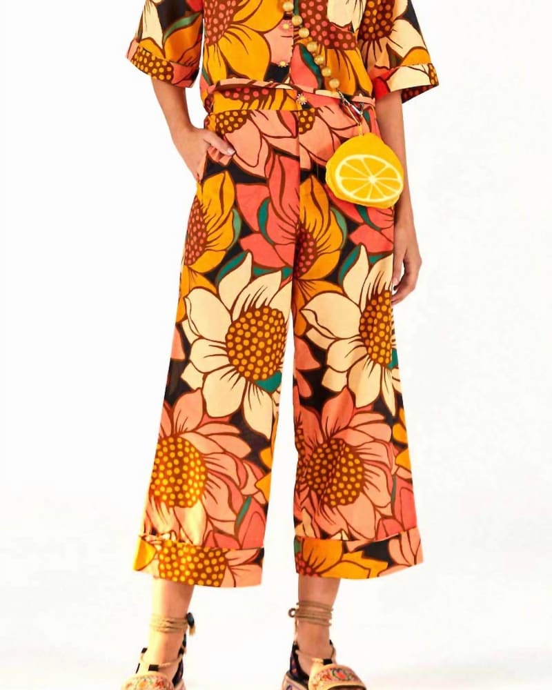 Front of a model wearing a size L Colorful Sunflower Pants In Multi in Multi by FARM RIO. | dia_product_style_image_id:351045